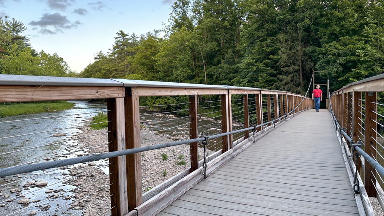 A pedestrian footbridge that crosses Fall Creek.